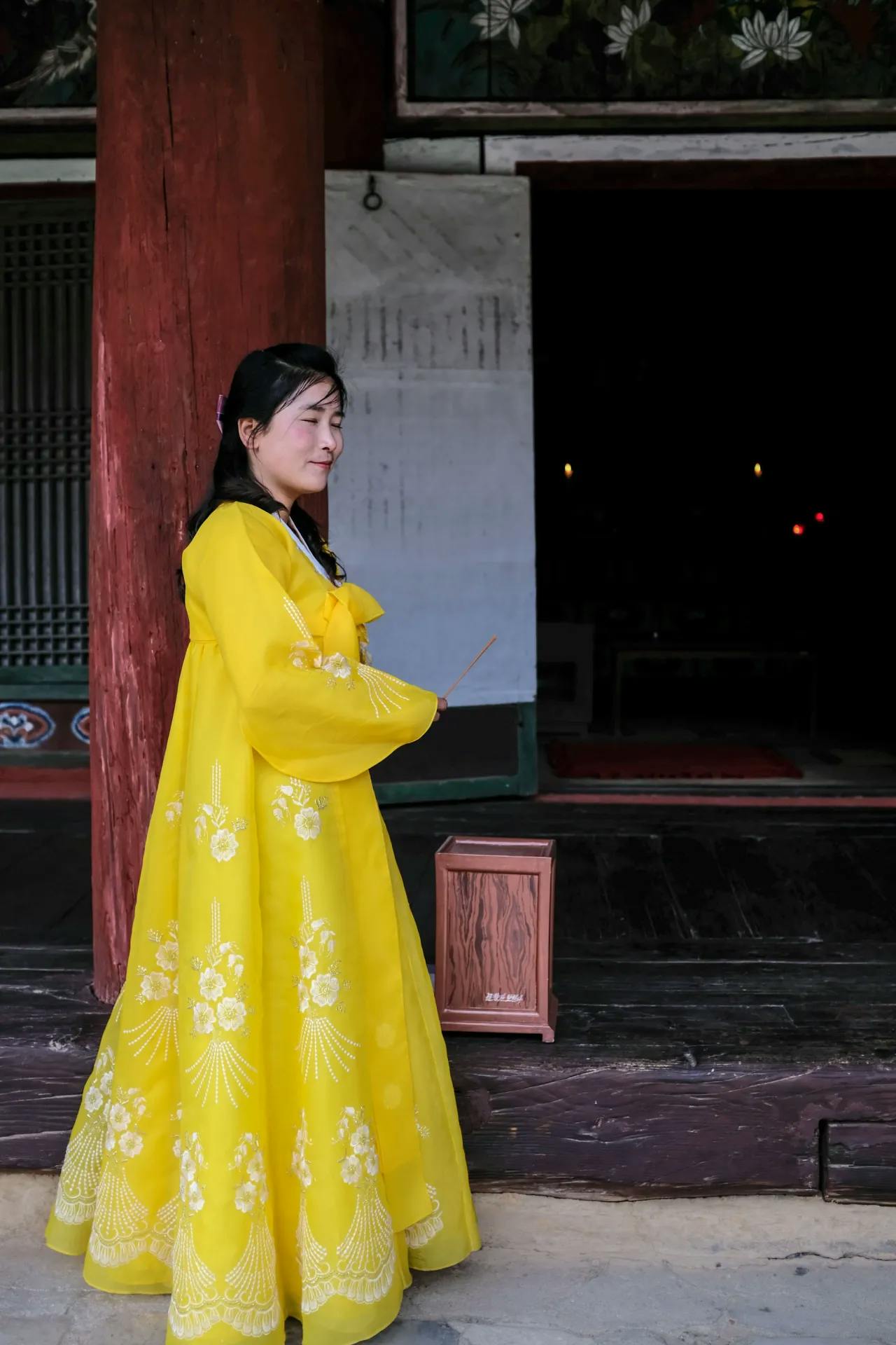 Lady in Hanbok outside a North Korean temple